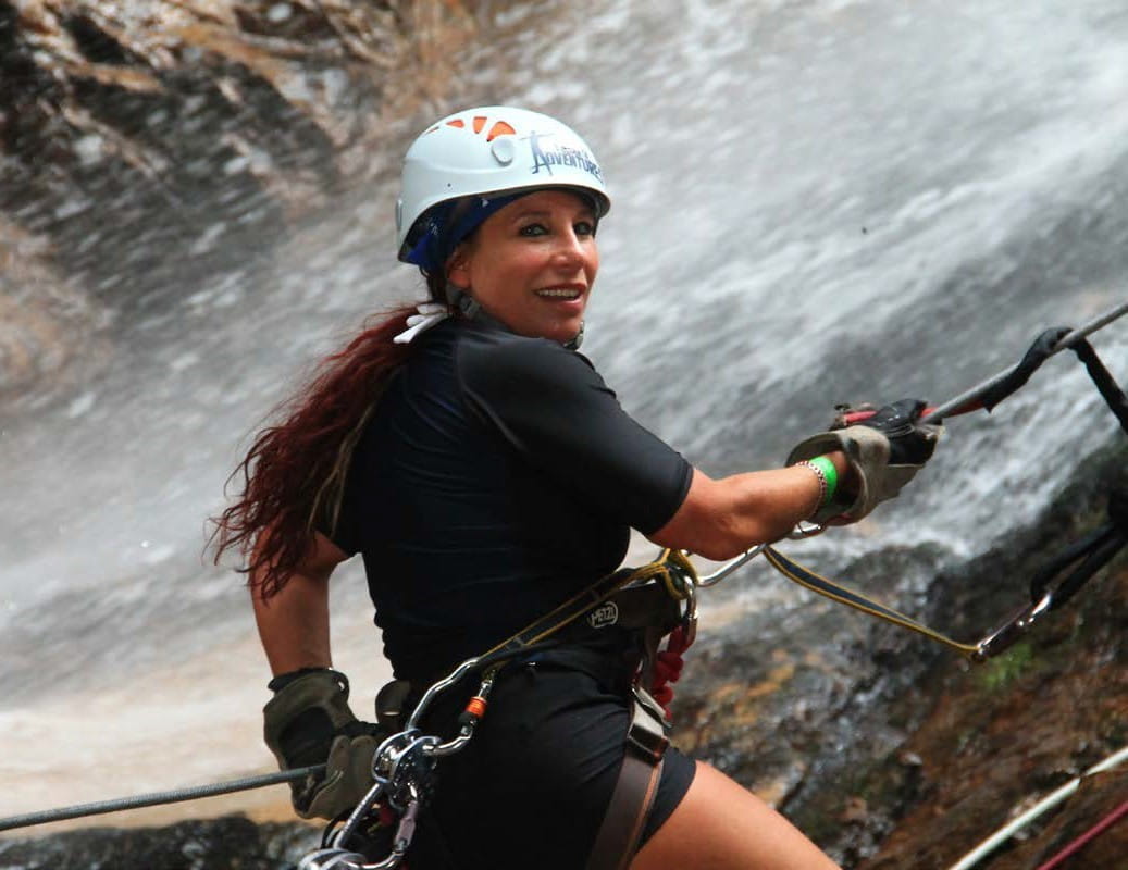 Suzy rappelling in Mismaloya, Mexico